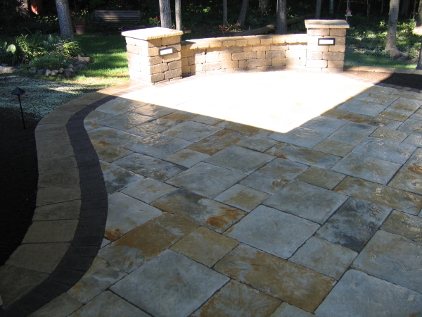 Fieldstone Patio with Brick Wall